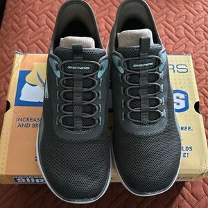 Sketchers slip-ins, size 9, olive green, worn once.